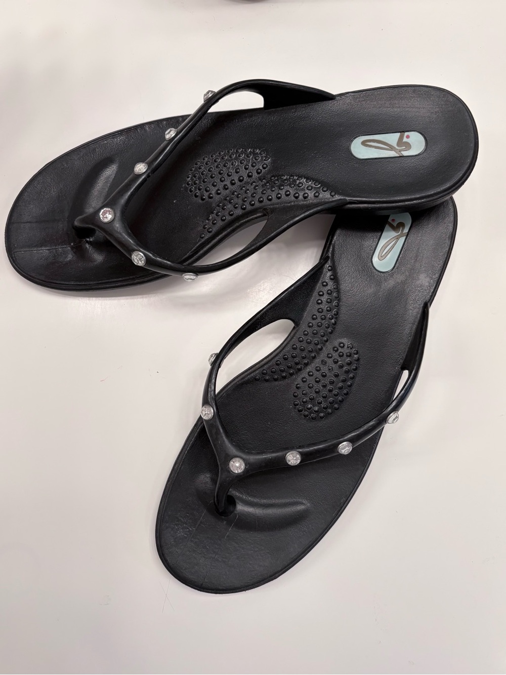 OKA-b black flip flops / sandals with rhinestone accents